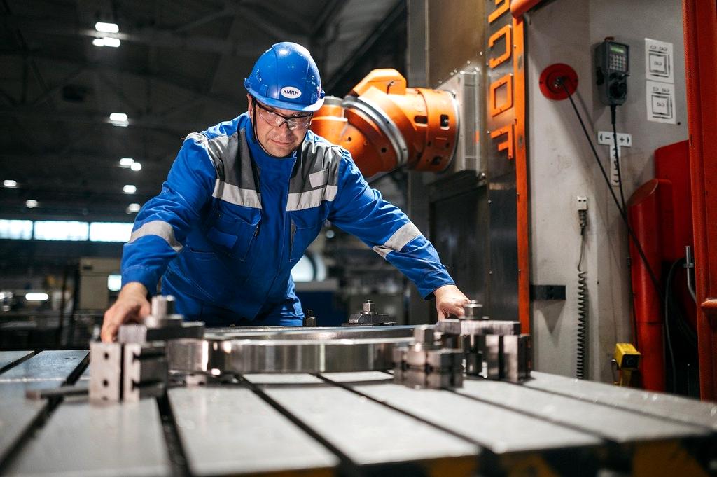 Industrial factory with robotic arms and AI systems